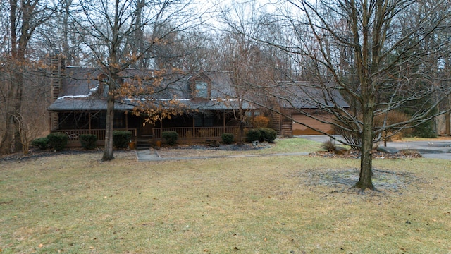 view of yard with covered porch