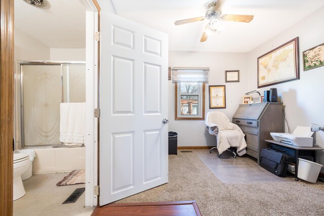 home office featuring visible vents, baseboards, and a ceiling fan