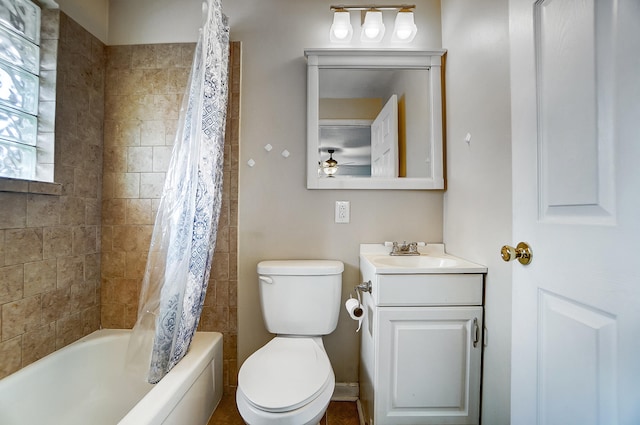 full bathroom with shower / bath combination with curtain, ceiling fan, vanity, and toilet