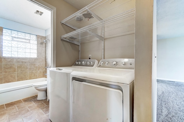 laundry area featuring separate washer and dryer