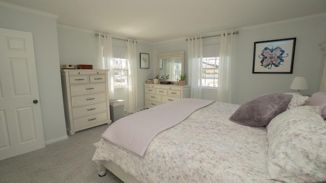 carpeted bedroom featuring ornamental molding