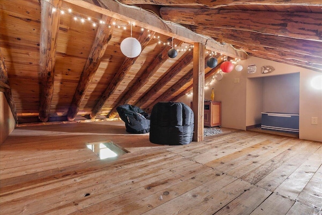 11350 Powhatan Path, Lakeview, OH 43331 - additional living space with hardwood / wood-style flooring and wood ceiling