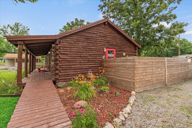 11350 Powhatan Path, Lakeview, OH 43331 - view of home's exterior with log siding
