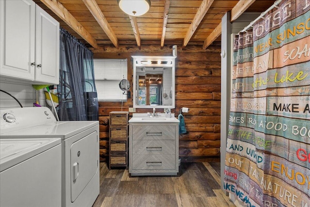11350 Powhatan Path, Lakeview, OH 43331 - laundry area featuring rustic walls, washer and clothes dryer, wood ceiling, dark wood-style flooring, and cabinet space