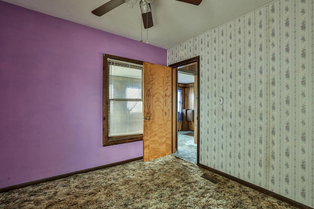 1024 Ansel Dr, Dayton, OH 45419 - carpeted empty room with ceiling fan and baseboards