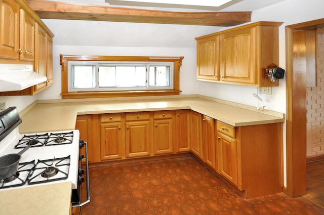 332 N Main St, New Madison, OH 45346 - kitchen featuring white gas range, extractor fan, beam ceiling, and light countertops