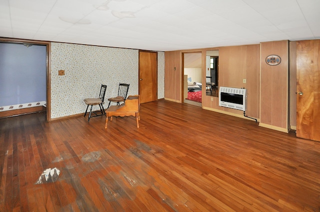 332 N Main St, New Madison, OH 45346 - unfurnished room featuring heating unit, hardwood / wood-style flooring, wallpapered walls, and baseboards