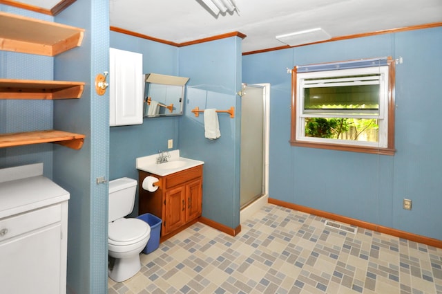 332 N Main St, New Madison, OH 45346 - full bath with a stall shower, crown molding, toilet, baseboards, and vanity