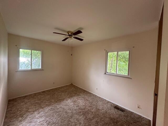 1432 Attleboro Ave, Springfield, OH 45503 - empty room with carpet flooring and ceiling fan