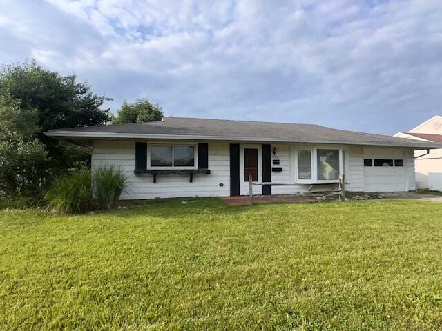 1432 Attleboro Ave, Springfield, OH 45503 - ranch-style house with an attached garage and a front lawn