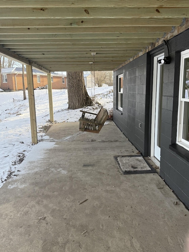 view of snow covered patio