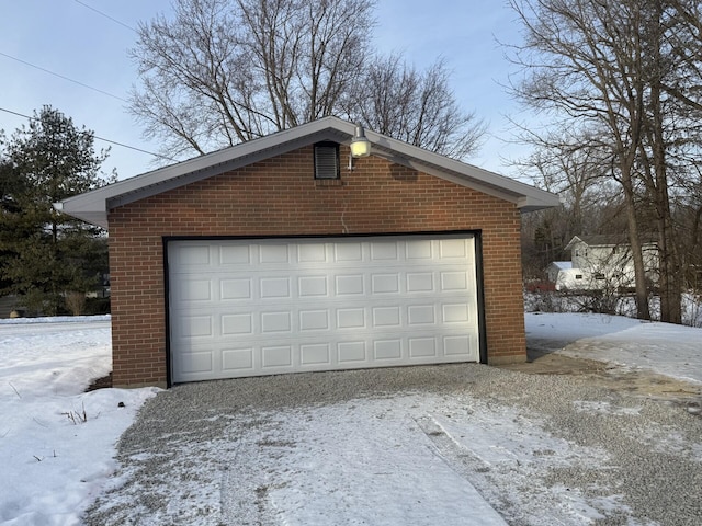 view of snow covered garage