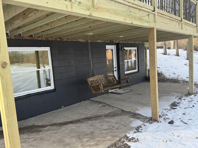 view of snow covered patio