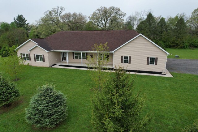 4344 N US Highway 68, West Liberty, OH 43357 - view of front of property with a front yard and a patio area