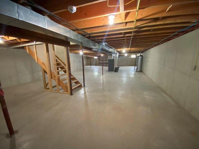 4344 N US Highway 68, West Liberty, OH 43357 - unfinished basement with stairs and gas water heater