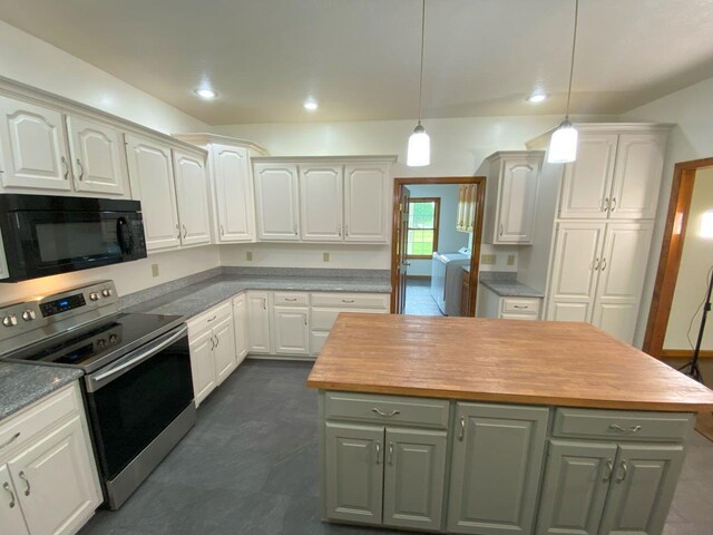 4344 N US Highway 68, West Liberty, OH 43357 - kitchen with wooden counters, washer and dryer, stainless steel electric stove, white cabinetry, and black microwave