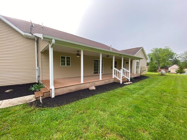 4344 N US Highway 68, West Liberty, OH 43357 - view of home's exterior with a shingled roof and a yard