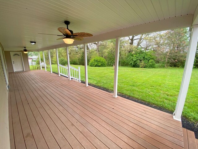 4344 N US Highway 68, West Liberty, OH 43357 - wooden deck with a ceiling fan and a lawn