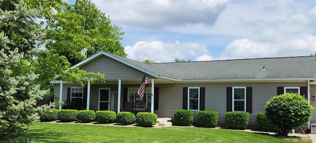 608 Kells Ln, Richwood, OH 43344 - view of front of house with a front lawn, a porch, and a shingled roof