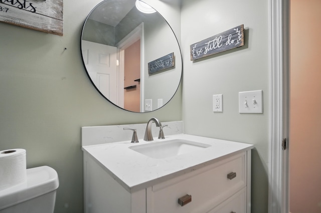 half bath with toilet and vanity