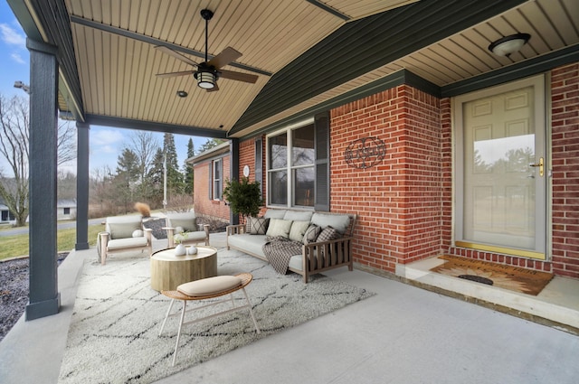 view of patio with ceiling fan and an outdoor living space