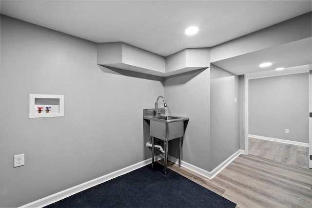 laundry area with recessed lighting, baseboards, wood finished floors, and hookup for a washing machine