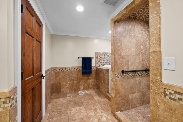 full bath with visible vents, a walk in shower, ornamental molding, recessed lighting, and tile walls