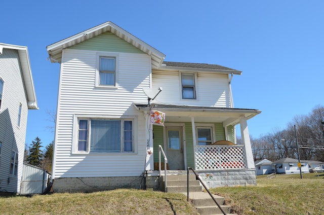 1170 Selma Rd, Springfield, OH 45505 - traditional-style home featuring a front lawn and covered porch