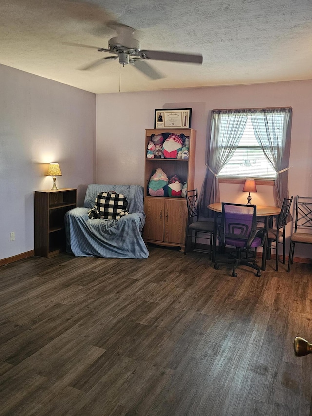 6822 Watercraft Dr, Huntsville, OH 43324 - living area with wood finished floors, ceiling fan, and a textured ceiling