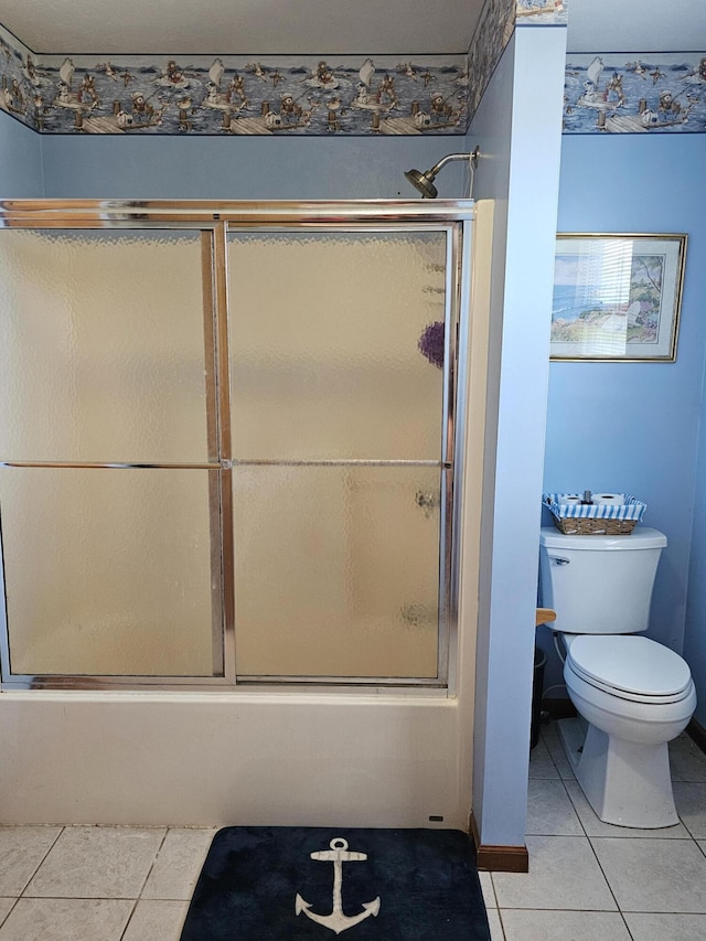 6822 Watercraft Dr, Huntsville, OH 43324 - bathroom featuring tile patterned floors and combined bath / shower with glass door