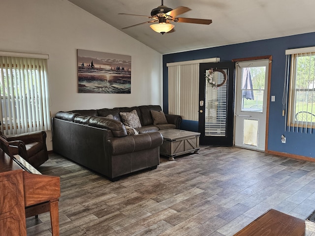 6822 Watercraft Dr, Huntsville, OH 43324 - living room featuring vaulted ceiling, ceiling fan, and wood finished floors