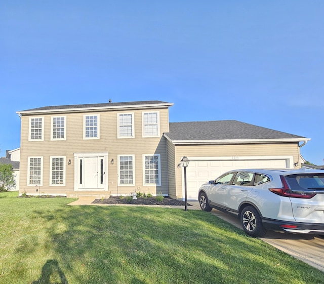 2973 Kicking Bird Trce, Dublin, OH 43017 - colonial-style house featuring a front lawn, an attached garage, and driveway