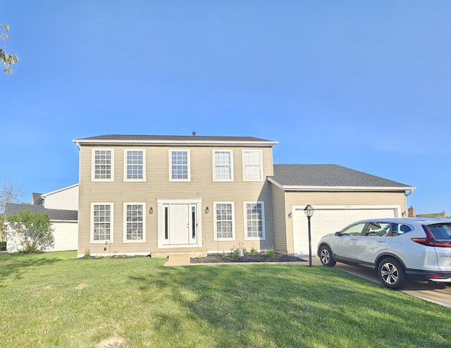 2973 Kicking Bird Trce, Dublin, OH 43017 - colonial inspired home featuring a garage, a front lawn, and concrete driveway