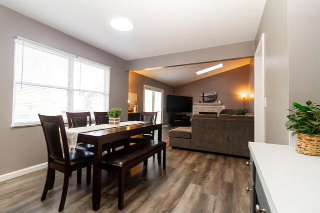 2973 Kicking Bird Trce, Dublin, OH 43017 - hallway featuring dark carpet and an upstairs landing
