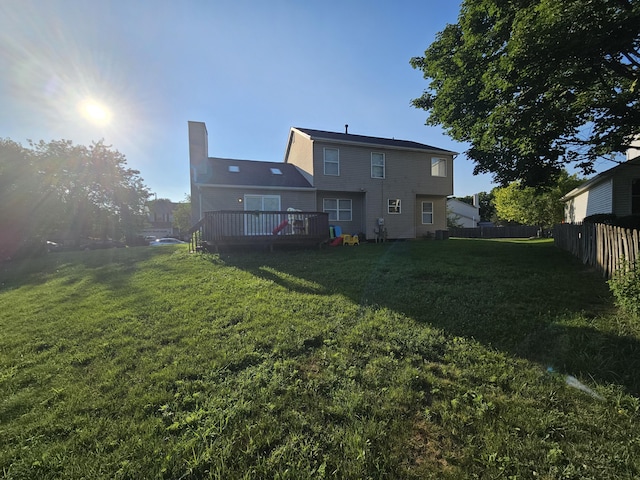 2973 Kicking Bird Trce, Dublin, OH 43017 - rear view of property with a deck and a chimney