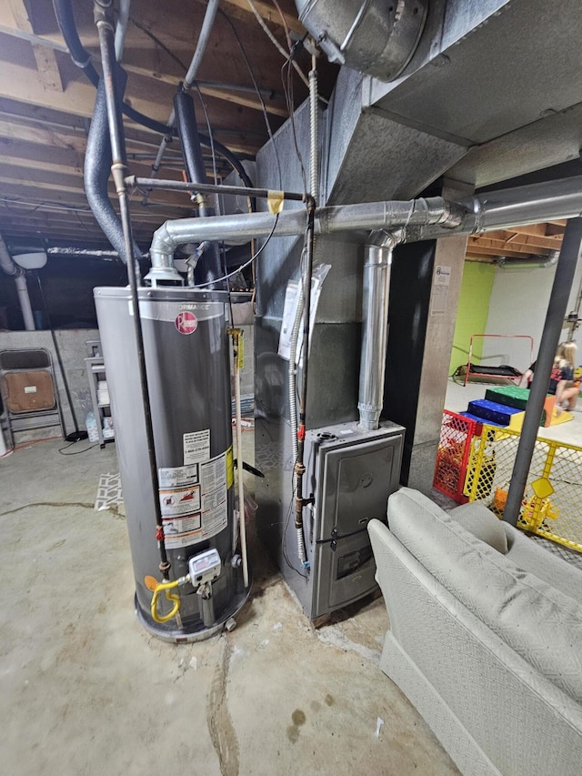 2973 Kicking Bird Trce, Dublin, OH 43017 - utility room with water heater and heating unit