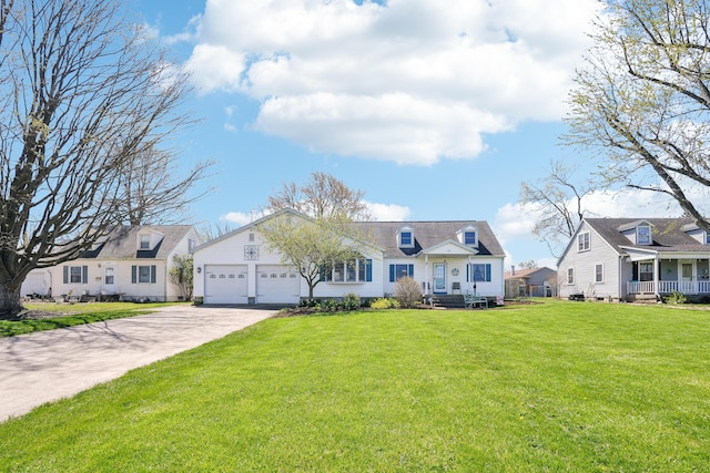 view of front facade featuring a garage, a front yard, and concrete driveway
