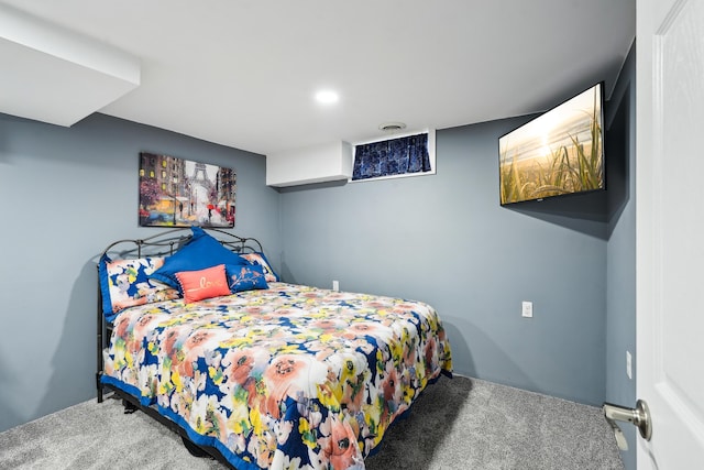 bedroom featuring visible vents and carpet flooring
