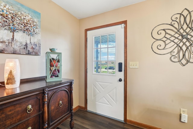 entryway with baseboards and dark wood-style flooring