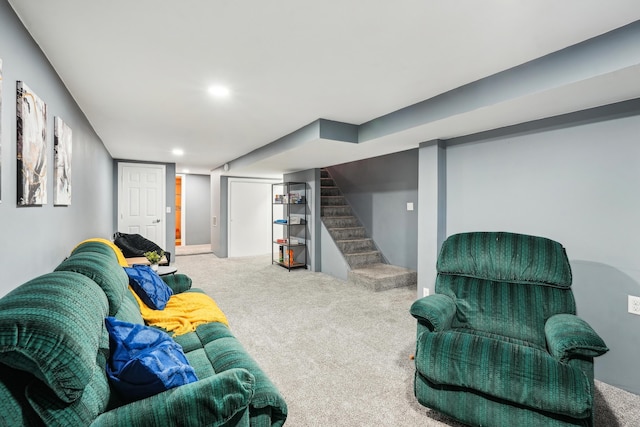 living area with recessed lighting, carpet, and stairway