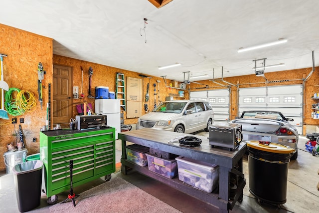 garage with freestanding refrigerator