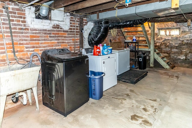 unfinished below grade area with separate washer and dryer