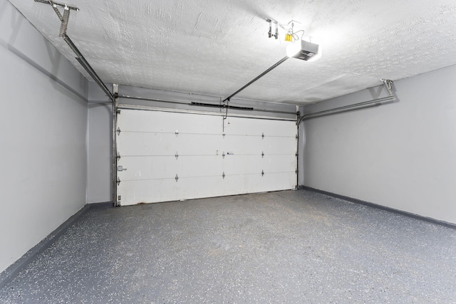 3667 Randee Ln, Springfield, OH 45502 - garage with a garage door opener and baseboards