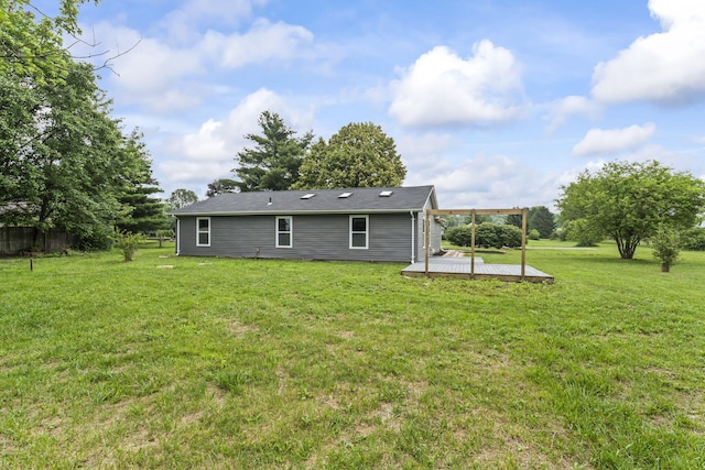 3667 Randee Ln, Springfield, OH 45502 - back of property with a wooden deck and a carport
