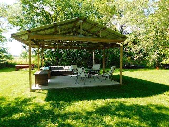 view of community featuring a gazebo, a yard, an outdoor hangout area, and a patio