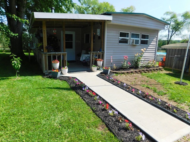 exterior space with a yard and fence