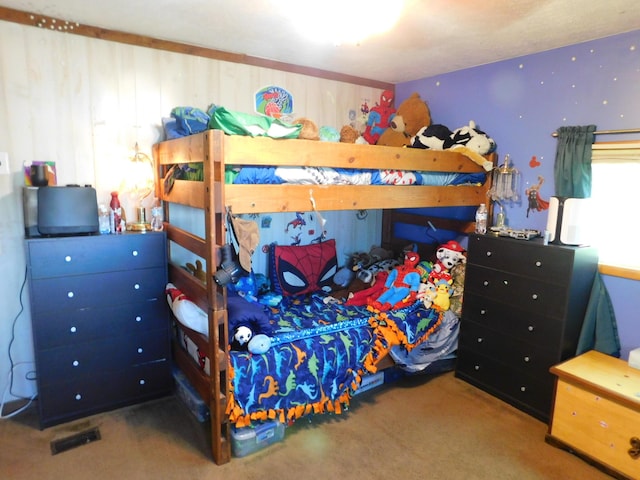 bedroom featuring visible vents and carpet