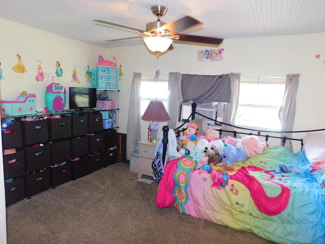 carpeted bedroom with a ceiling fan