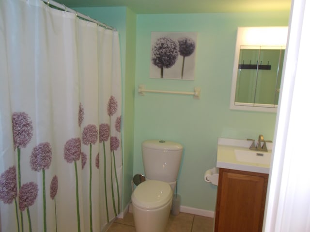 1145 W Bank Unit 106, Celina, OH 45822 - bathroom featuring vanity, tile patterned flooring, and a shower with curtain