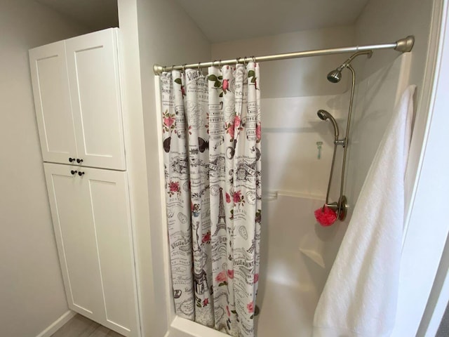 full bathroom featuring a stall shower